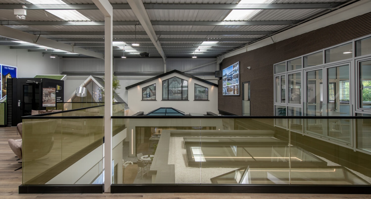 Modern Milton Keynes showroom featuring large bi-folding doors and spacious interior for home improvement displays.