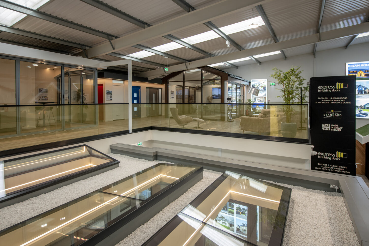 Showroom display of modern bi-folding doors at Express Bifolds in Milton Keynes, showcasing sleek design and high-quality materials.
